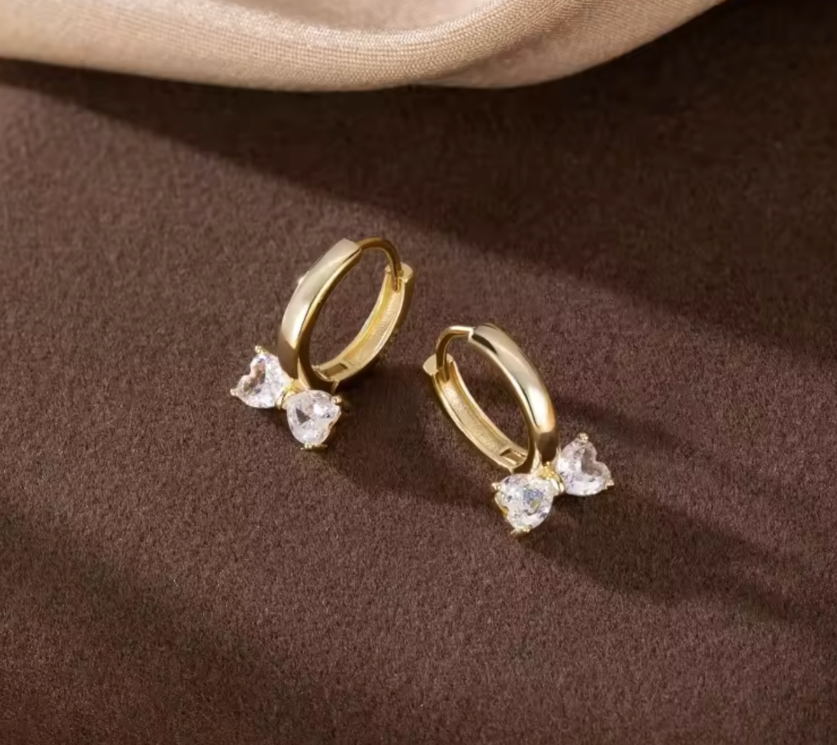 Sterling Silver CZ Bow Huggie Hoop Earrings