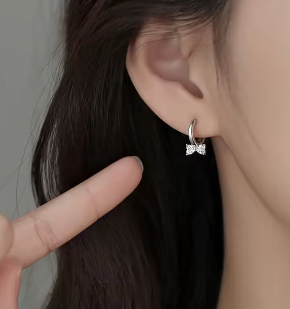 Sterling Silver CZ Bow Huggie Hoop Earrings